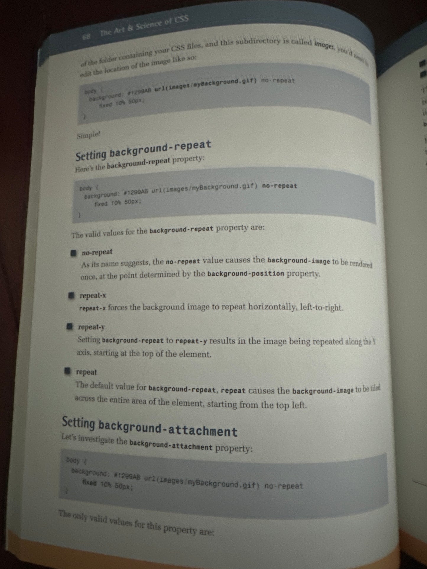 Open book page explaining CSS background properties and values.