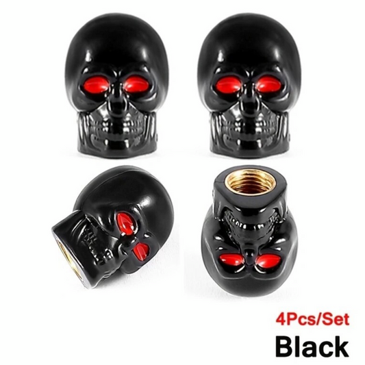 Black skull-shaped tire valve caps with red eyes, set of 4.