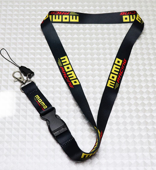 Momo Racing black lanyard with yellow and red text, hook closure.