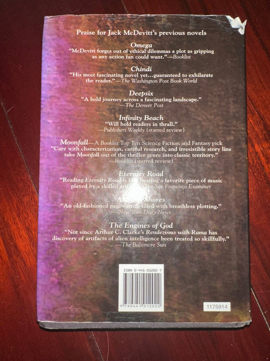 Back cover of Jack McDevitts book with praise reviews and barcode.