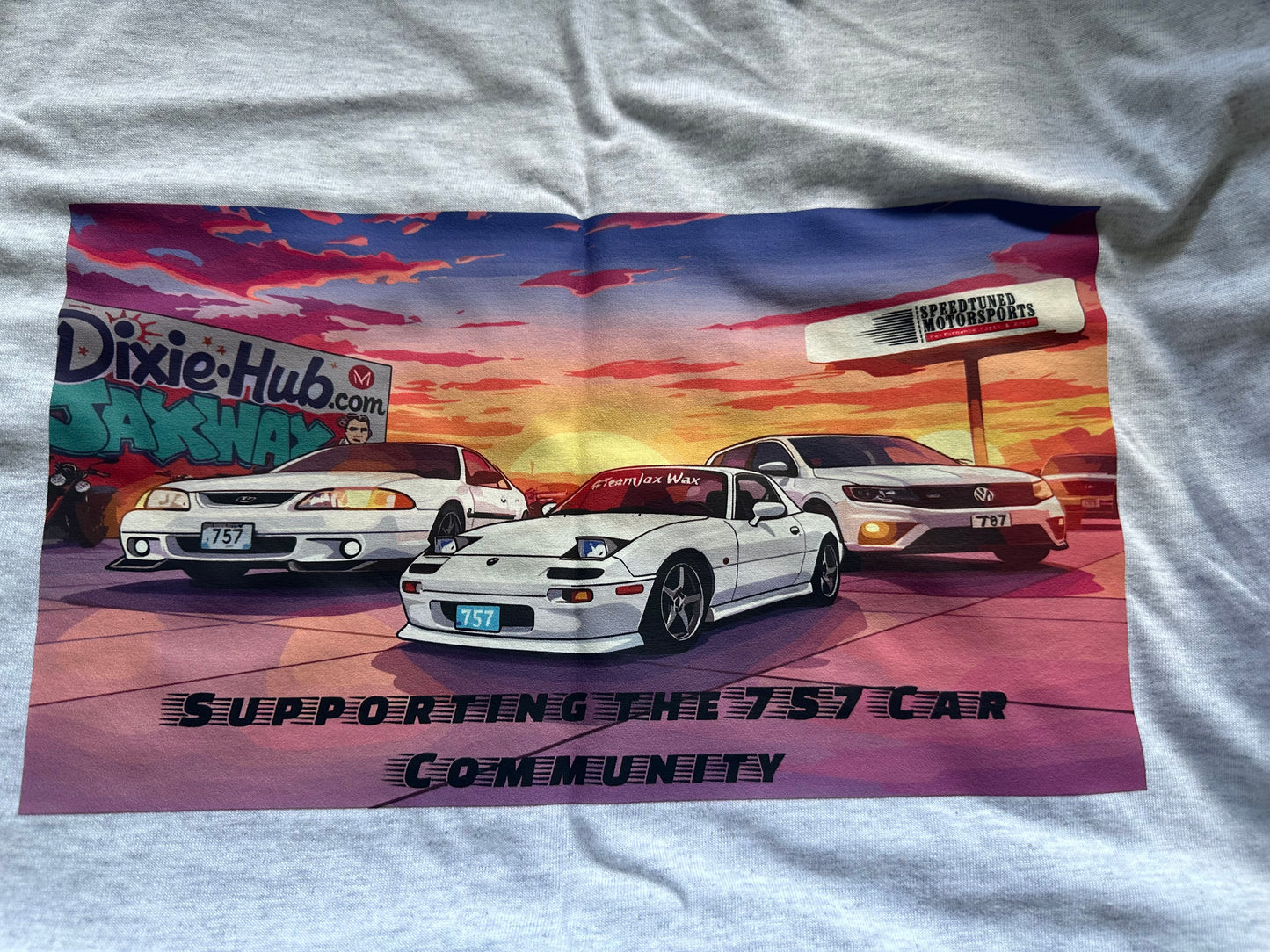 Vintage car rally t-shirt with sunset and classic cars.