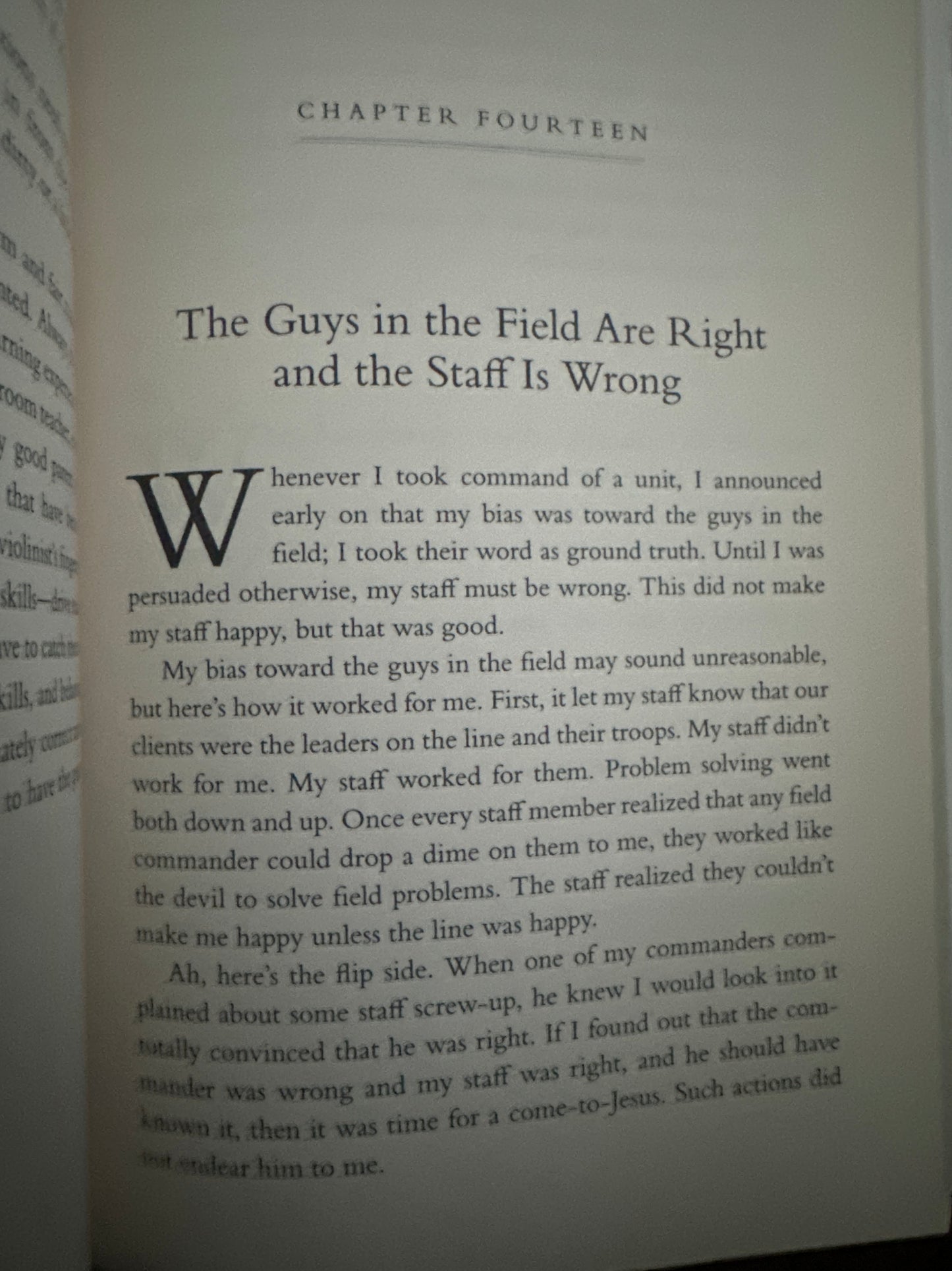 Book open to Chapter 14, titled The Guys in the Field Are Right and the Staff Is Wrong.