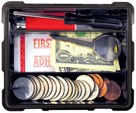 Black case with coins, dollar bill, key, and adhesive tube.
