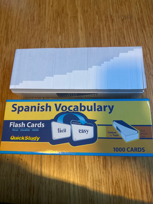 Spanish Vocabulary Flash Cards box with 1000 cards on wooden surface.