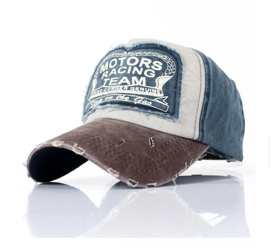 Vintage distressed baseball cap with Motors Racing Team patch.