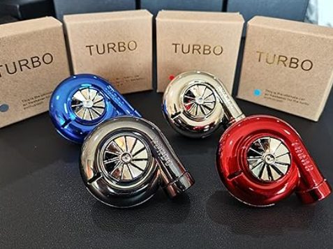 Three colorful turbocharger models displayed with TURBO boxes in the background.