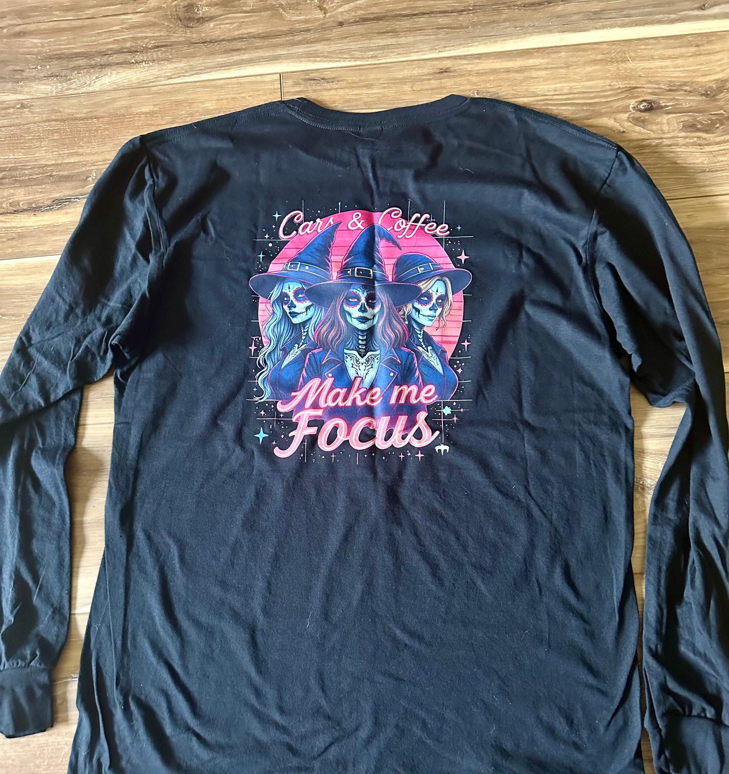 Black long-sleeve shirt with Car Coffee Make me Focus and three witch-themed skulls design.