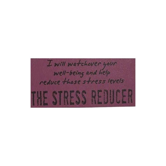 Pink sign reading I will watch over your well-being and help reduce those stress levels THE STRESS REDUCER