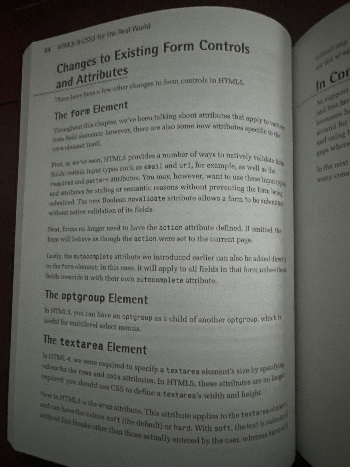 Open book page discussing HTML5 form controls and attributes.