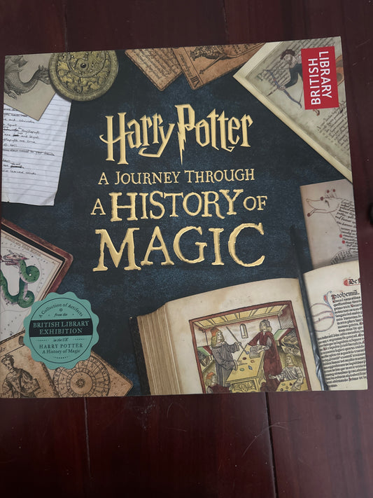 Harry Potter A Journey Through a History of Magic book cover with vintage illustrations.