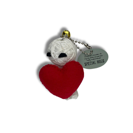 White plush keychain with red heart and Special Hugs tag.