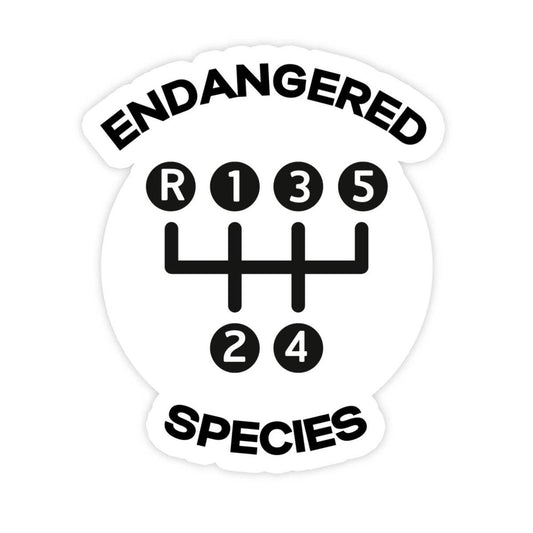 Car gear shift sticker with ENDANGERED SPECIES text.
