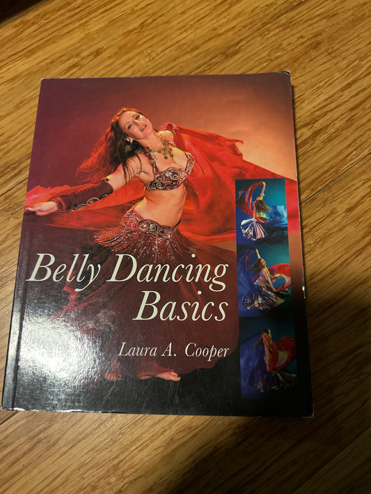 Cover of Belly Dancing Basics by Laura A. Cooper, featuring a dancer in motion.