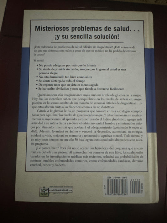 Back cover of a health book in Spanish, discussing diabetes and blood sugar levels.