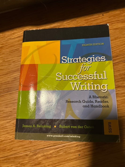 Strategies for Successful Writing textbook on wooden surface.