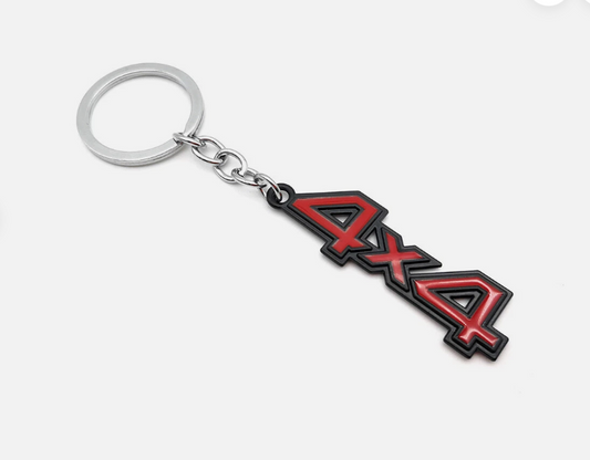 Red 4x4 keychain with silver ring and chain.