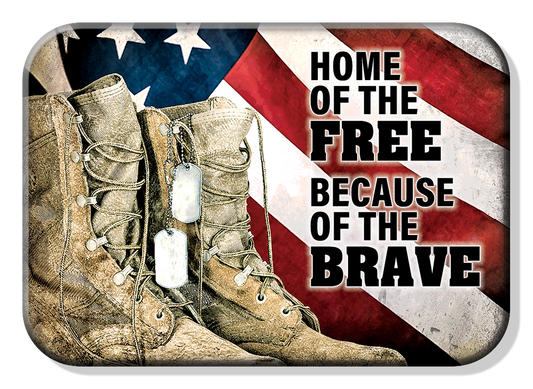 Military boots with dog tags on an American flag background.