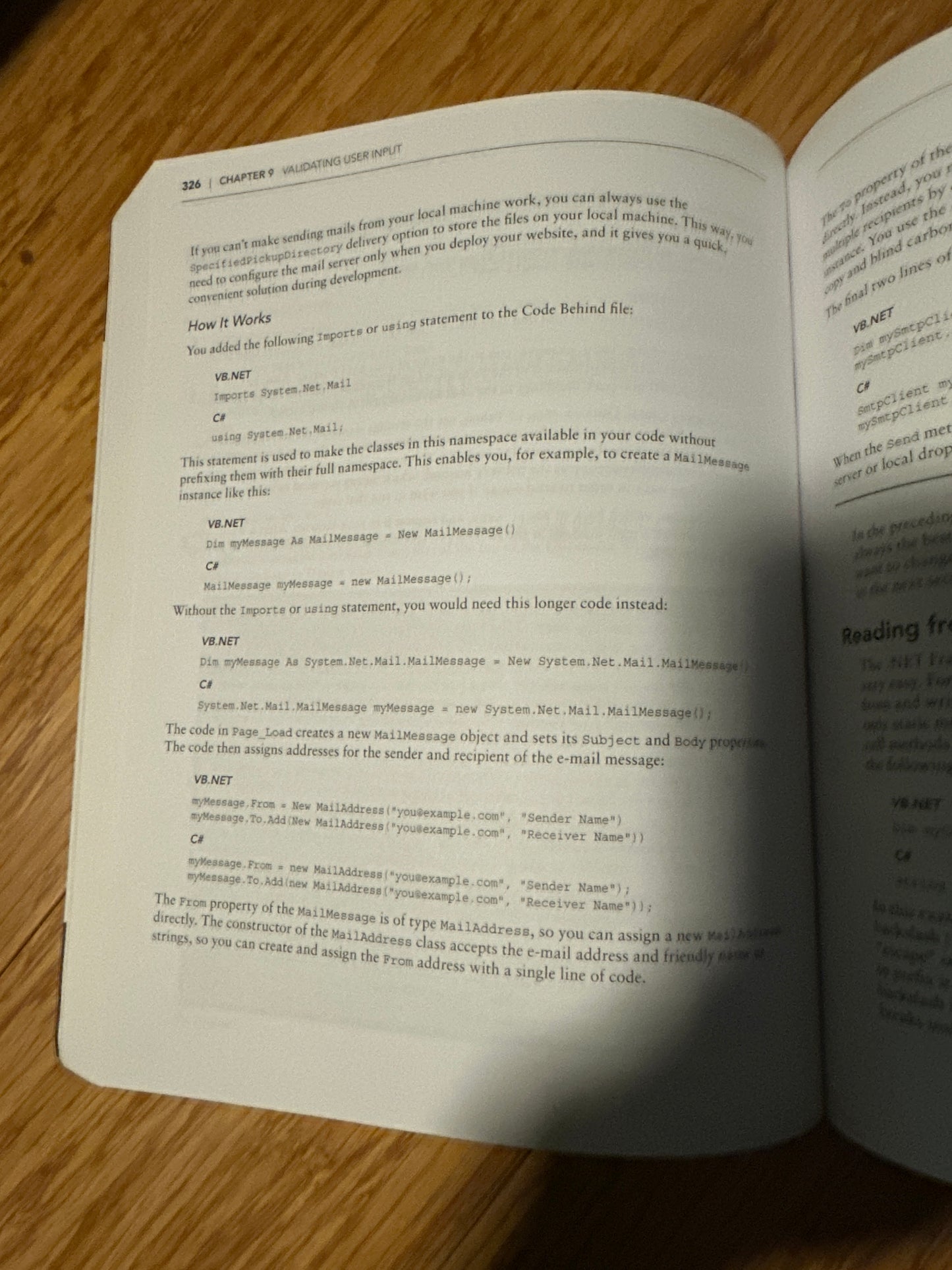 Open book page showing VB.NET code for email sending in development.