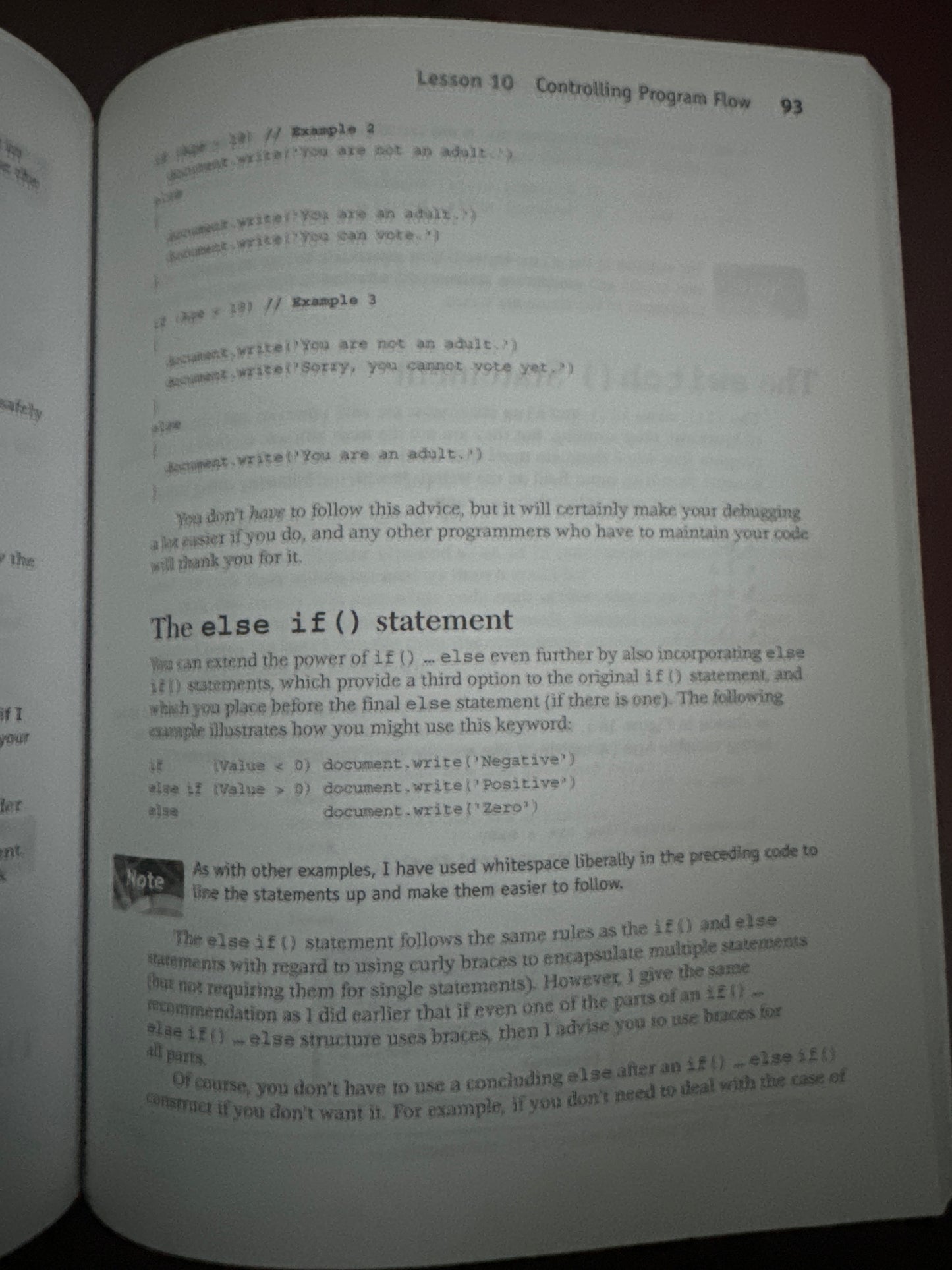 Open book page explaining the else if statement in programming.