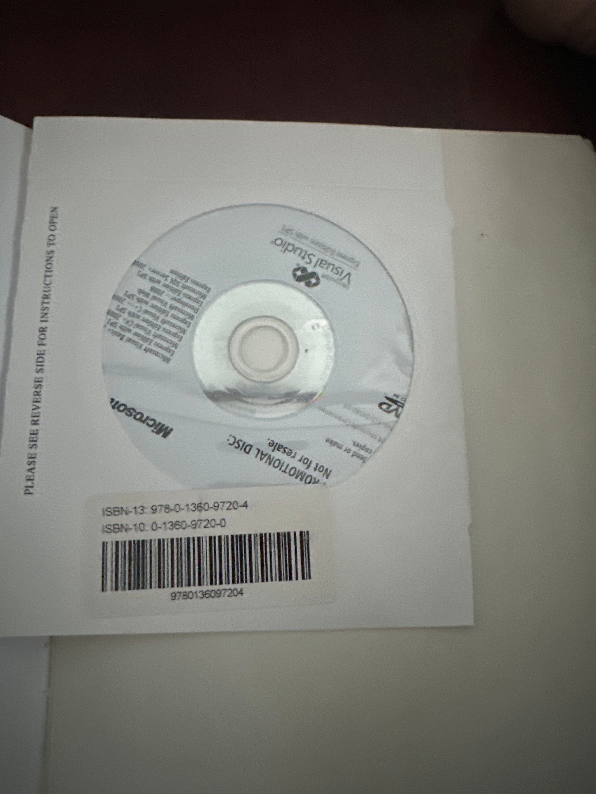 Microsoft Visual Studio promotional CD in white case with barcode.
