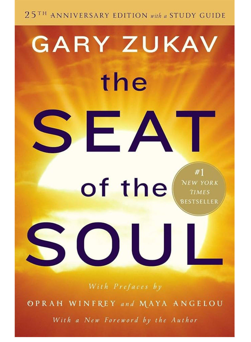 Book cover for The Seat of the Soul by Gary Zukav, featuring a glowing sun and sky.