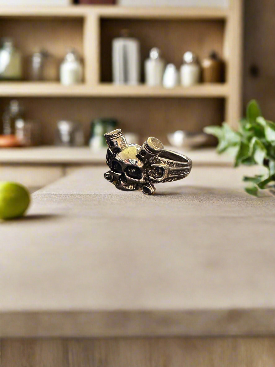 Vintage motorcycle engine ring on kitchen counter.