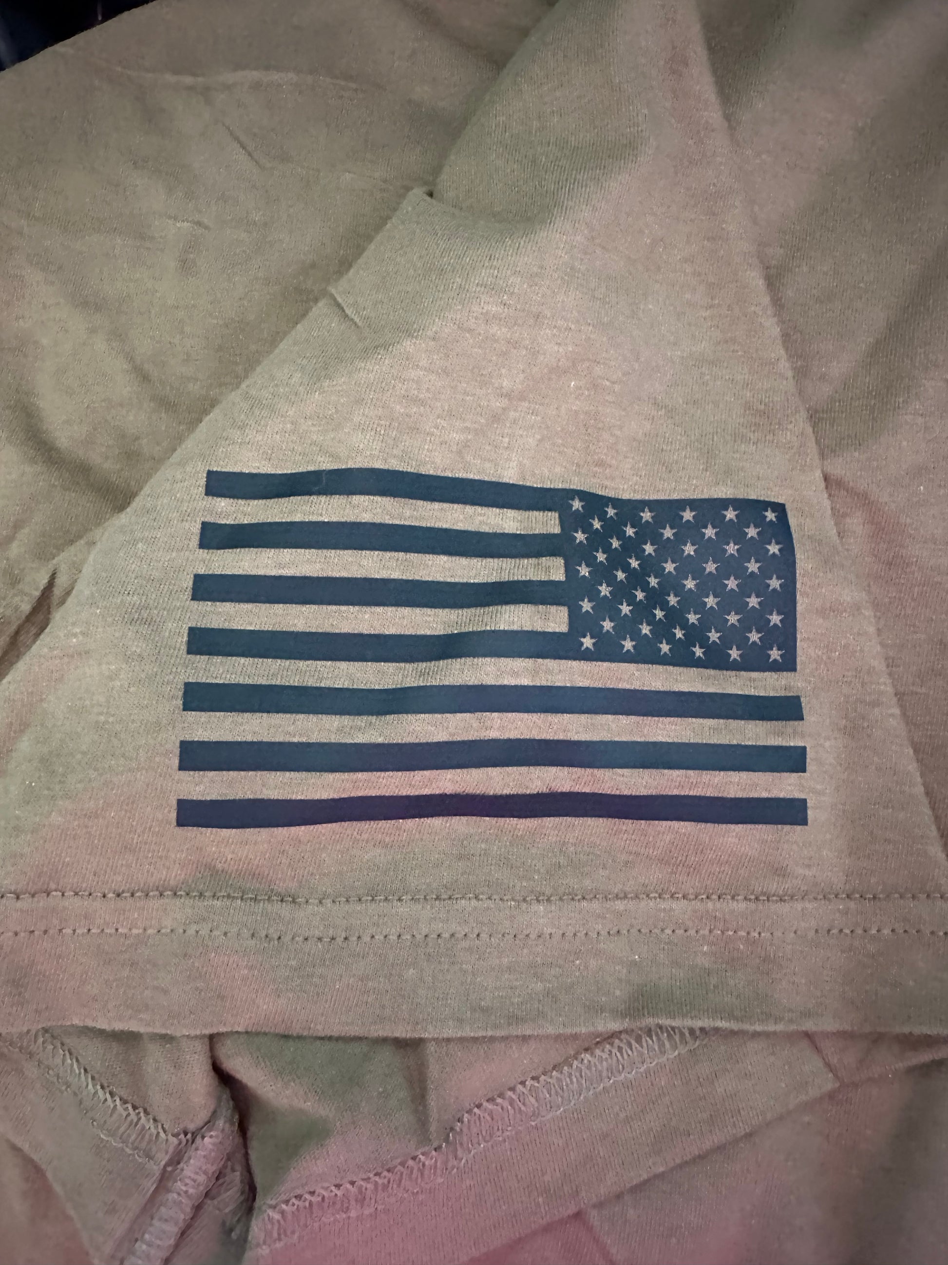 Vintage-style American flag design on a distressed t-shirt.