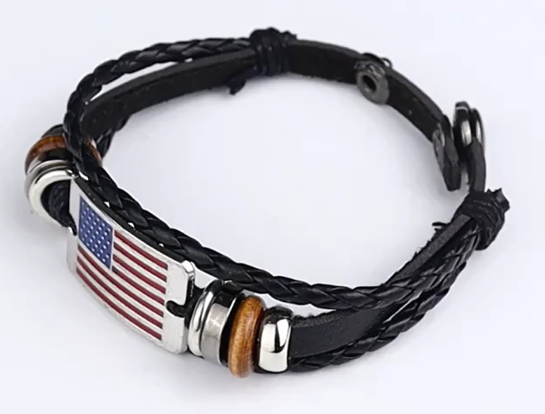 Black braided leather bracelet with American flag charm.