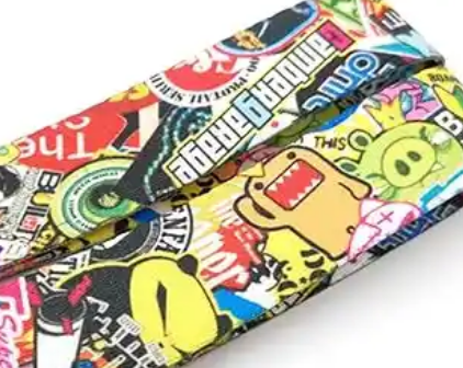 Colorful cartoon-themed phone case with various characters and text.