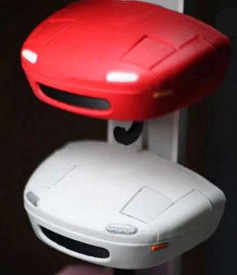 Red and white gaming controller with glowing lights.