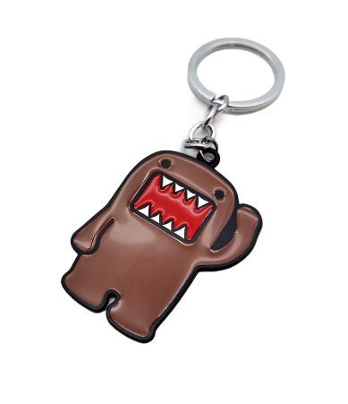 Brown Domo keychain with red mouth and silver ring.