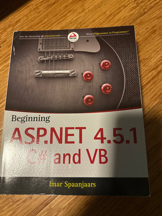 Cover of Beginning ASP.NET 4.5.1 C and VB by Imar Spaanjaars, featuring a guitar.