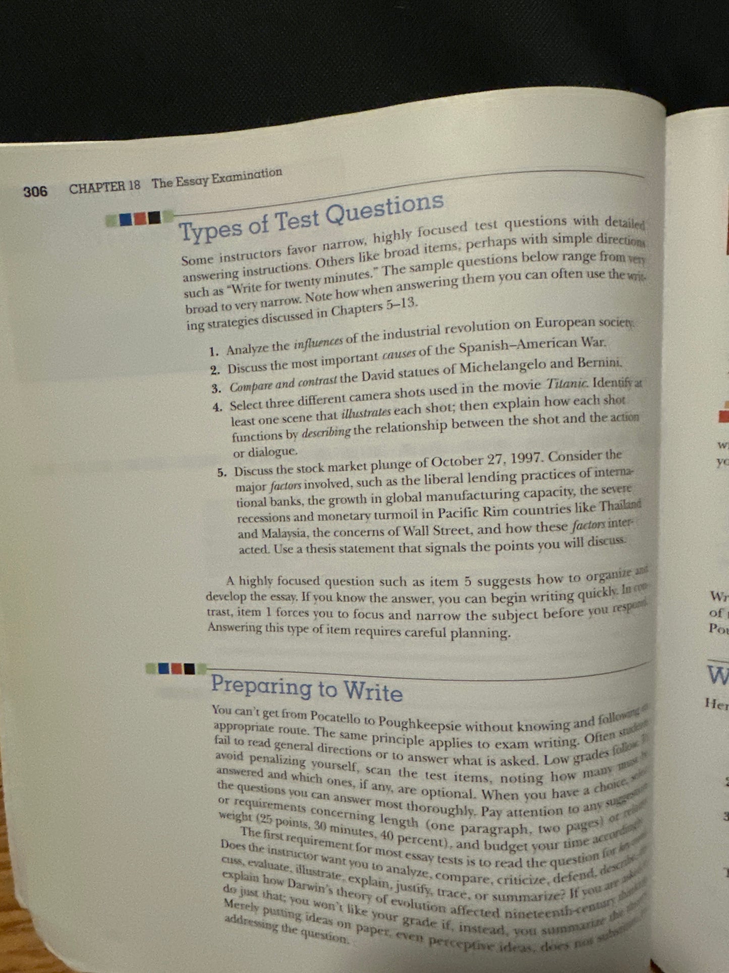 Open book page with essay examination questions and preparation tips.
