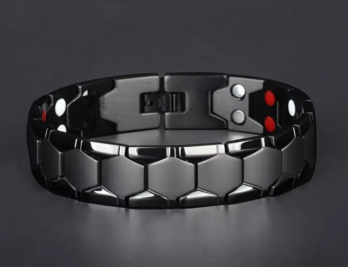 Black hexagonal magnetic bracelet with red and white accents.