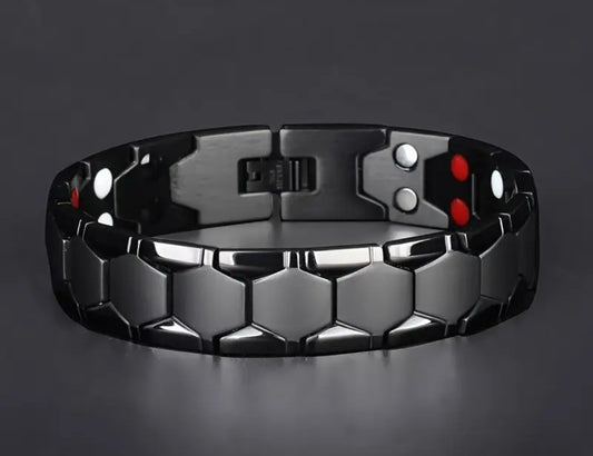Black hexagonal magnetic bracelet with red and white accents.