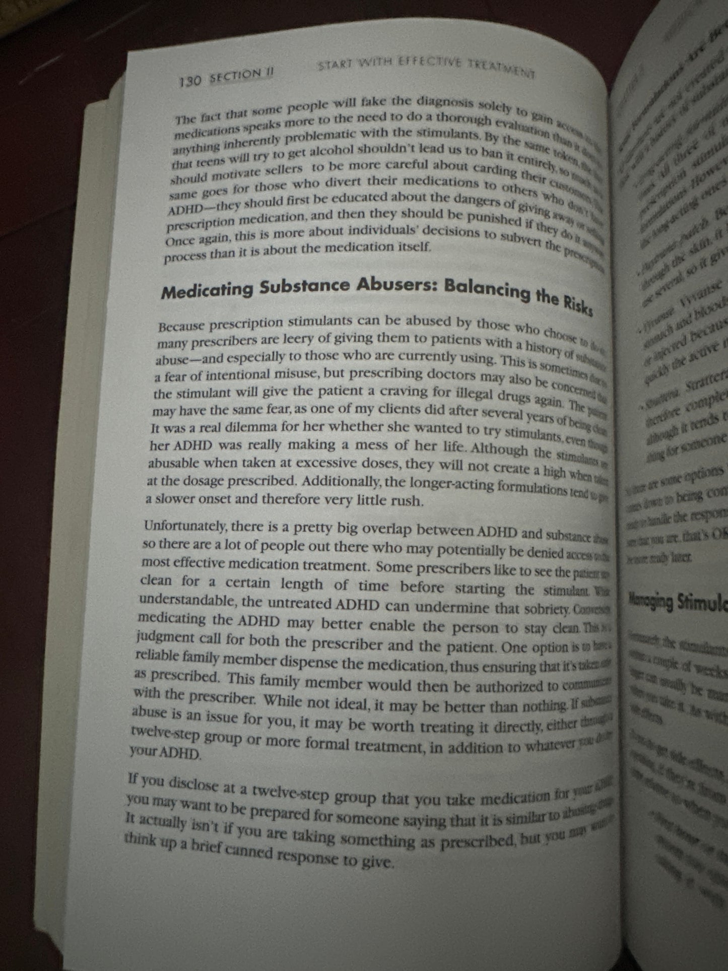 Open book page discussing medication for substance abuse and ADHD treatment.