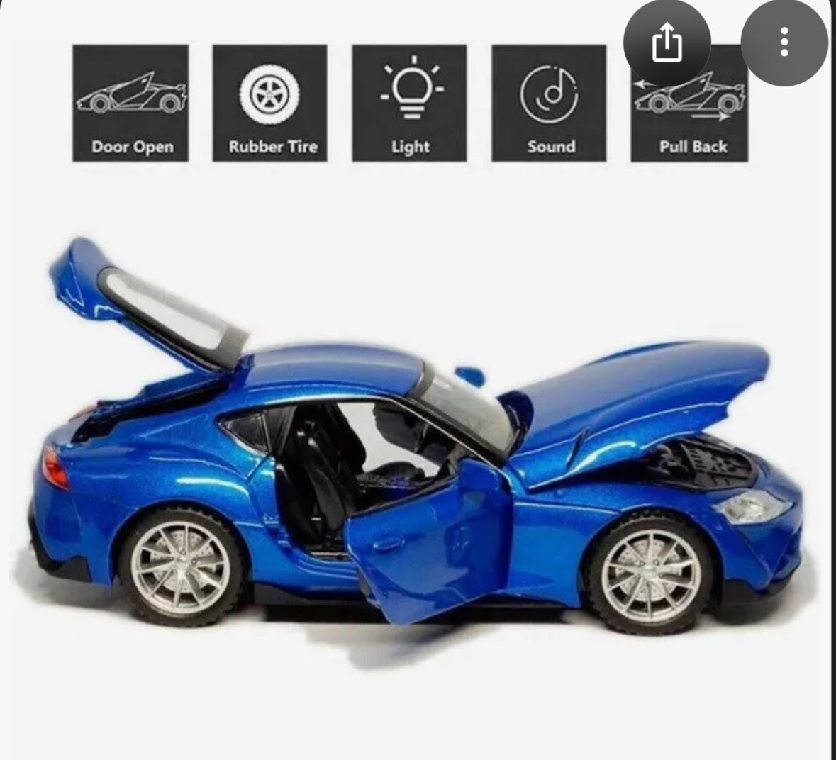 Blue toy sports car with open doors and rubber tires.