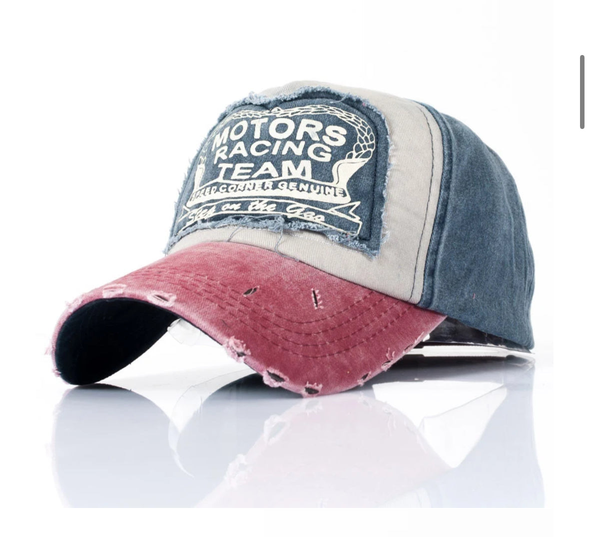 Vintage distressed baseball cap with Motors Racing Team patch.