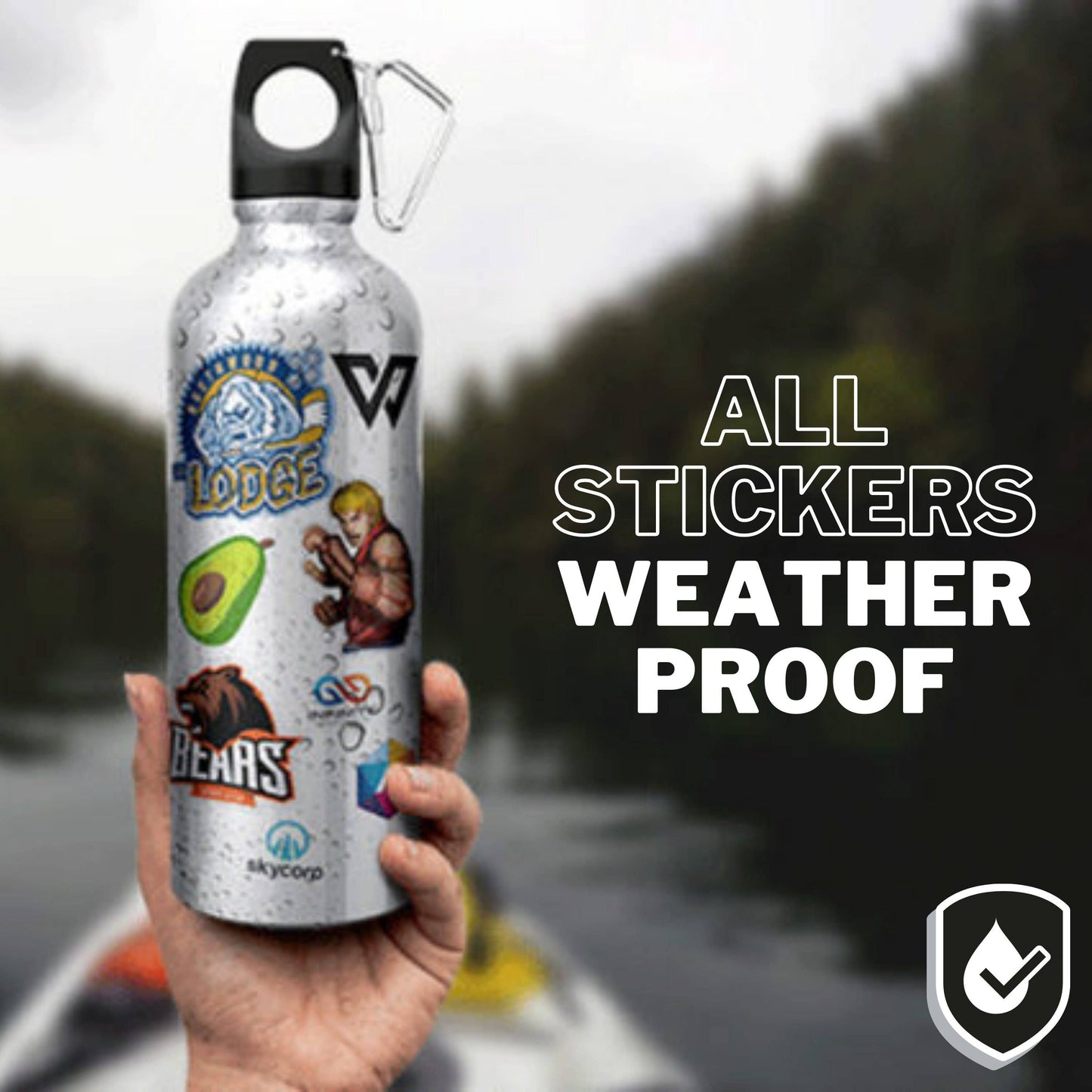 Hand holding a silver water bottle with colorful stickers.