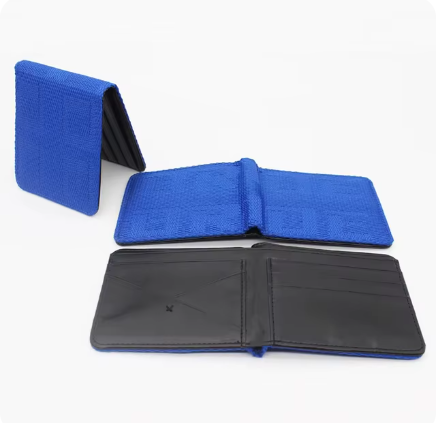 Blue textured wallet with black interior, open and closed views.