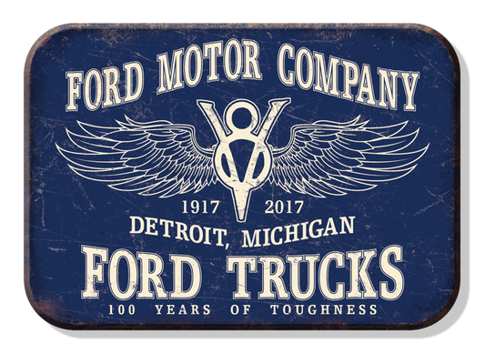Vintage Ford Motor Company sign celebrating 100 years of trucks.