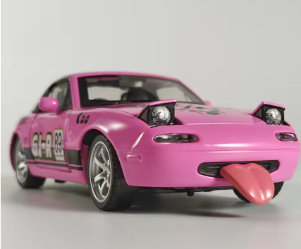 Pink toy car with a tongue sticking out, playful design.