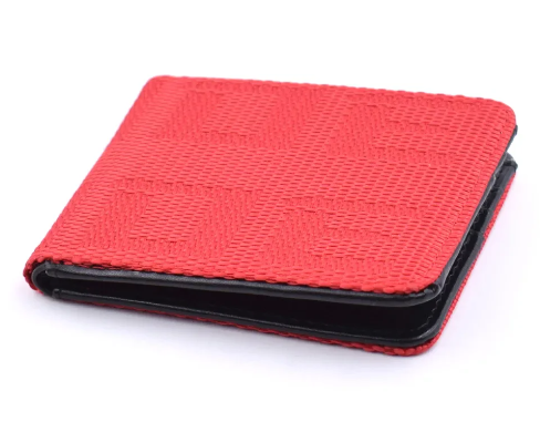 Red textured bi-fold wallet with black edges.
