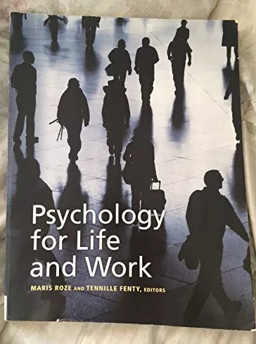 Silhouettes of people walking on a busy street, Psychology for Life and Work book cover.