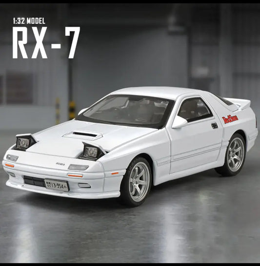 White 132 scale Mazda RX-7 model car with Redline logo.