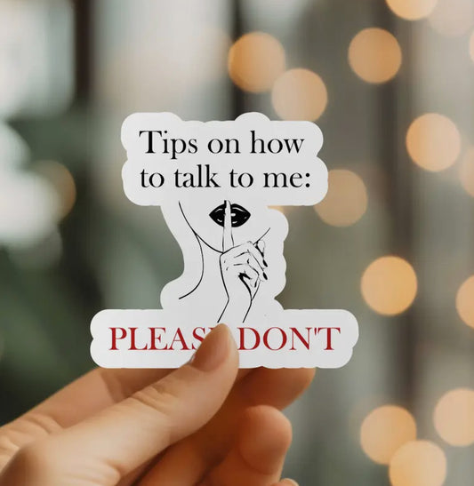 Hand holding sticker with text Tips on how to talk to me PLEASE DONT and a finger over lips illustration.