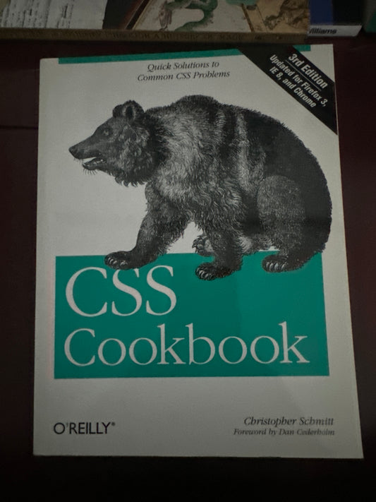 CSS Cookbook cover with bear illustration and book title.