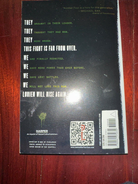 Back cover of Lorien Will Rise Again book with motivational text and barcode.