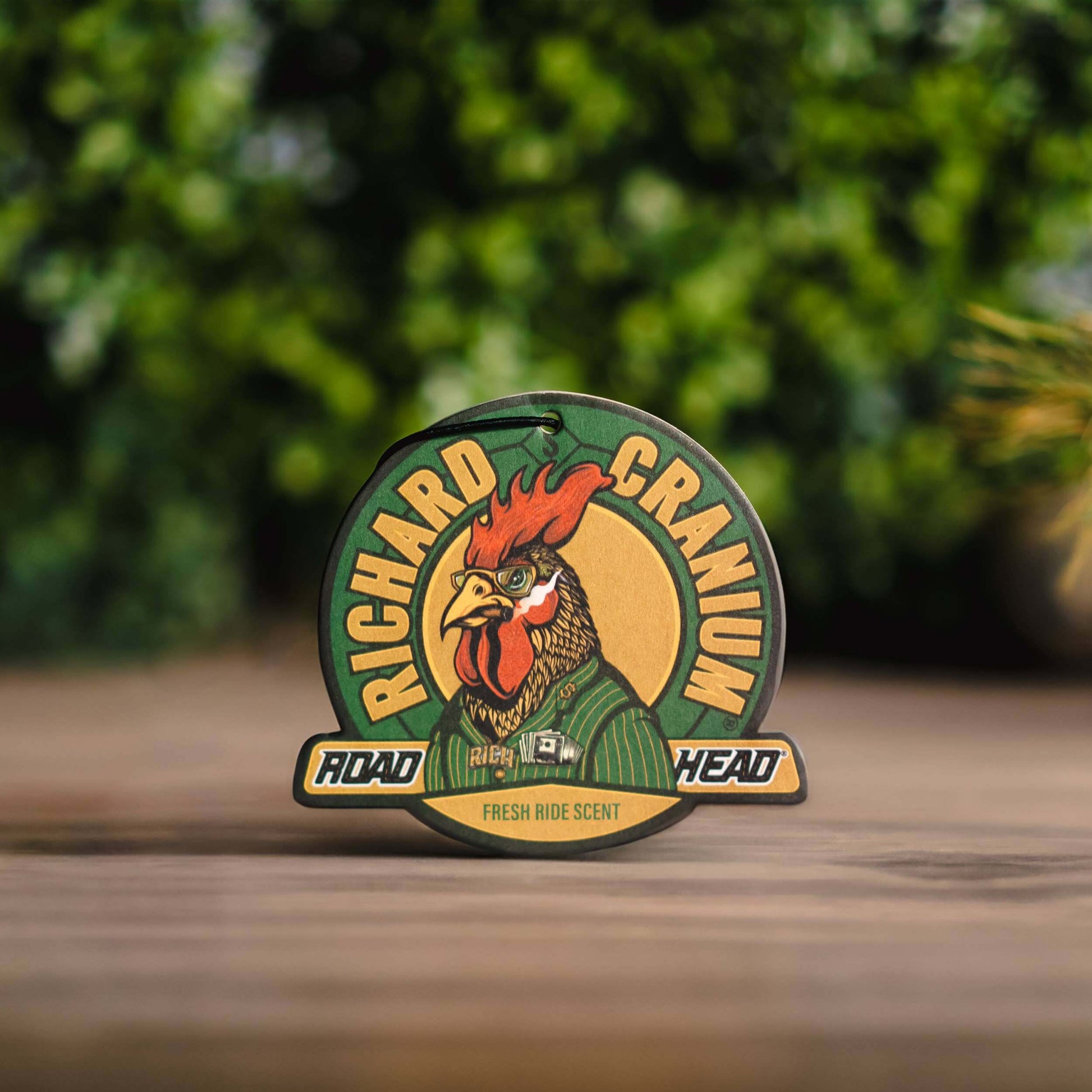 Richard Cranium air freshener with rooster design.