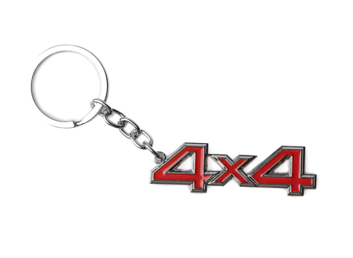 Red 4x4 keychain with silver ring and chain.